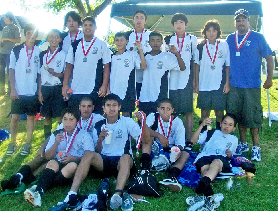 Top row left to right: Jeremy Brooks, Diego Rodriguez, Miguel Velasquez, Ricardo Gutierrez, Jaime Magdalene, Alexis Barajas, Marco Mora, Vincent Chavez, Franky Chavez, coach Alfonso Martinez. Bottom row: Christian Laureano, Brian Ayala, Hugo Valdovinos, Josh Valenzuela, Isaiah Martinez, not pictured Ruben Camarena.