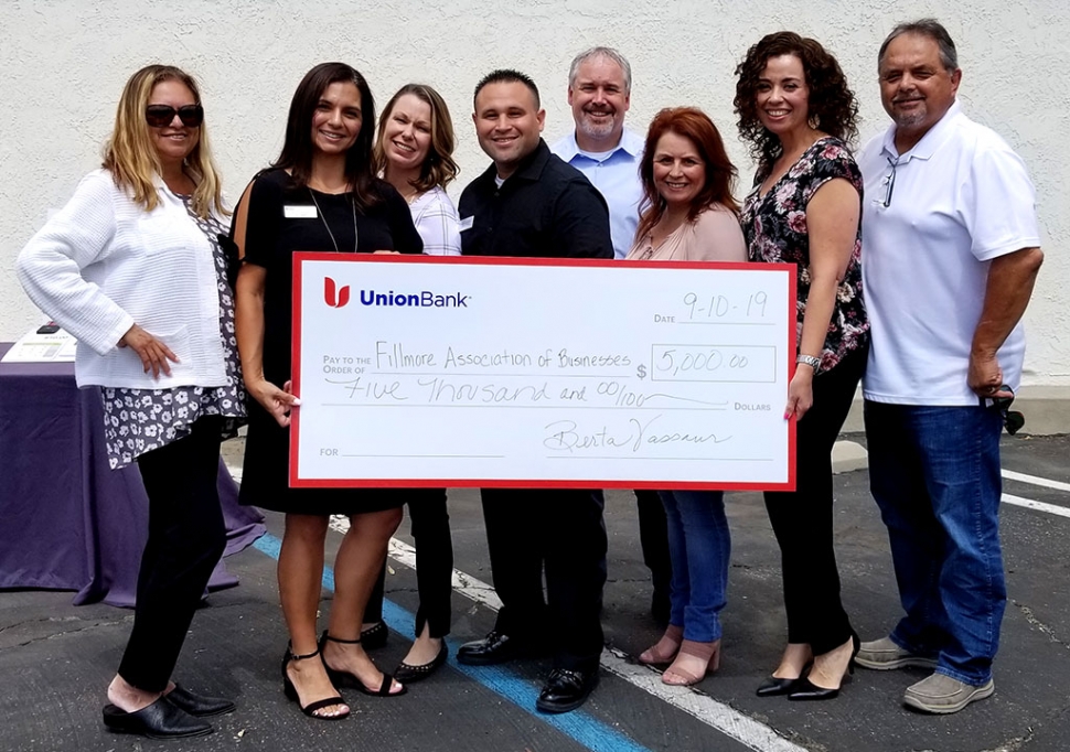 On Tuesday, September 10th at 12:15 p.m. Union Bank of Fillmore held a customer appreciation by bringing and In & Out food truck to give a free lunch to Union bank customers. They also took the opportunity to present a donation of $5,000 to the Fillmore Association of Businesses (FAB). Pictured (l-r) is Ari Larson, Berta Vassaur, Jaime Morales, Nico Vargas, Brian Gilpatrick, Theresa Robledo, Sandra Ambriz, and Ernie Villegas.