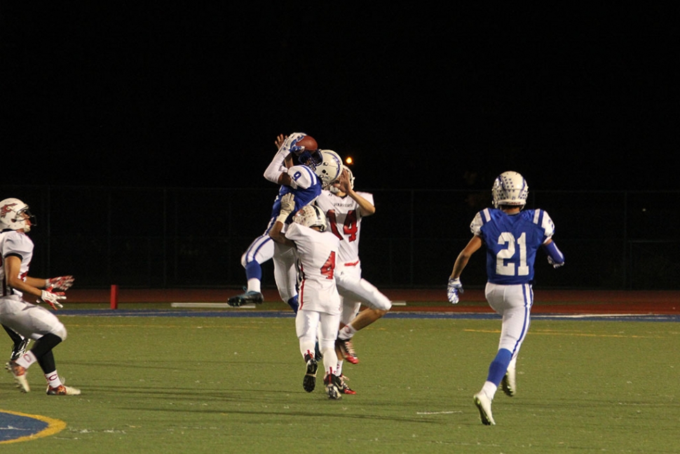 Varsity #9 Dominick Gonzalez catches first down pass