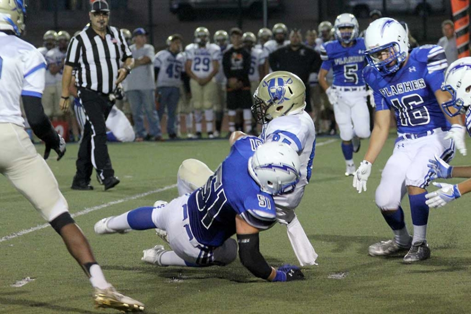 This Past Friday, the Fillmore Flashes took on the Channel Island Raiders at Fillmore. Line Backer #51 Kevin Galvan had a great game on defense. He had 13 tackles, 1 quarter back sack, and returned a fumble recovery 81 yards. Despite the Flashes effort, Varsity fell short, leaving the final score Channel Islands 34 to Fillmore 7. “We have had 9 turnovers in two games, we have to do a better job protecting the ball.” - Matt Dollar, Head Coach. Photos by Charles Morris and Crystal Gurrola.