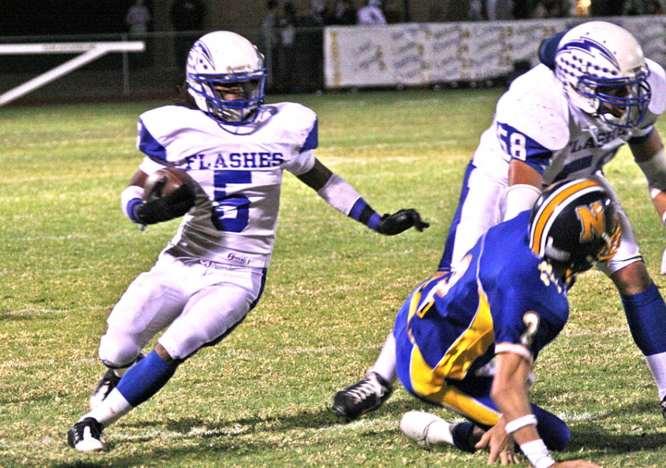 Troy Hayes #5 goes around the outside for yardage against Nordoff; Fillmore lost 42-7. (Football photos courtesy of Crystal Gurrola)
