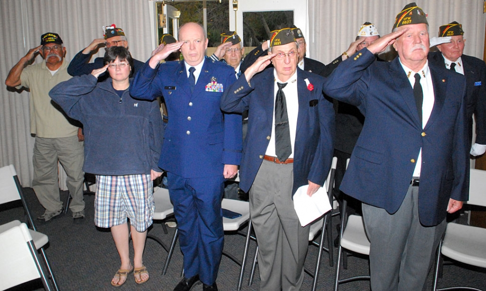 American Veterans salute the flag before the Pledge of Allegiance.