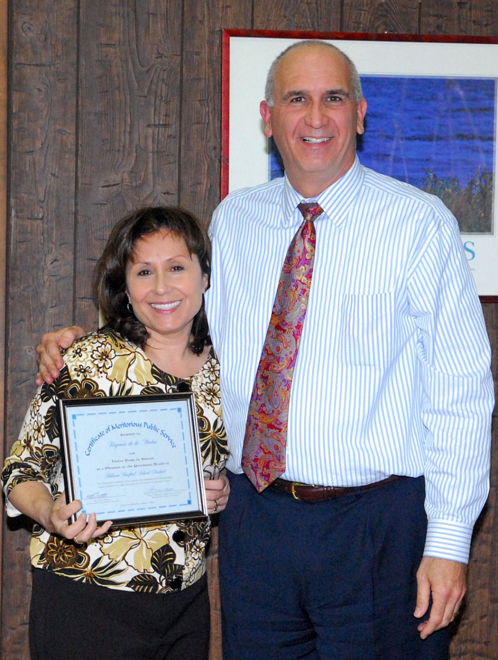 At last night’s school board meeting Superintendent Sweeney presented Virginia De la Piedra (left) a Certificate of Meritorious Public Service.