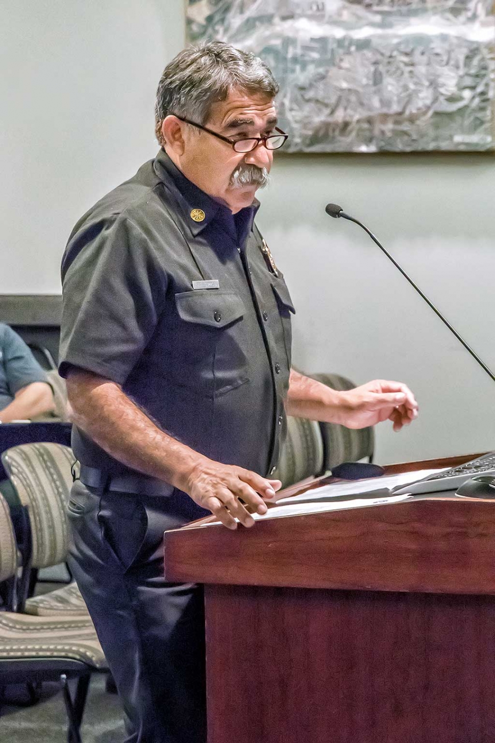 Fillmore Fire Chief Keith Gurrola spoke at the May 10th council meeting on behalf of the acceptance of field inventory of properties requiring weed and rubbish abatement, instruction to the Fire Chief to notify those property owners, and adoption of the City Council resolution NO. 16-3530 declaring said properties to be a public nuisance and setting a public hearing for abatement on June 14, 2016. Gurrola acknowledged that weeds and rubbish can cause a nuisance, but more importantly a fire hazard. He brought forth the possible issues of who was on the list, but assured the Council that any misunderstandings would be resolved promptly. The motion to accept the field inventory was carried. Photo by Bob Crum.