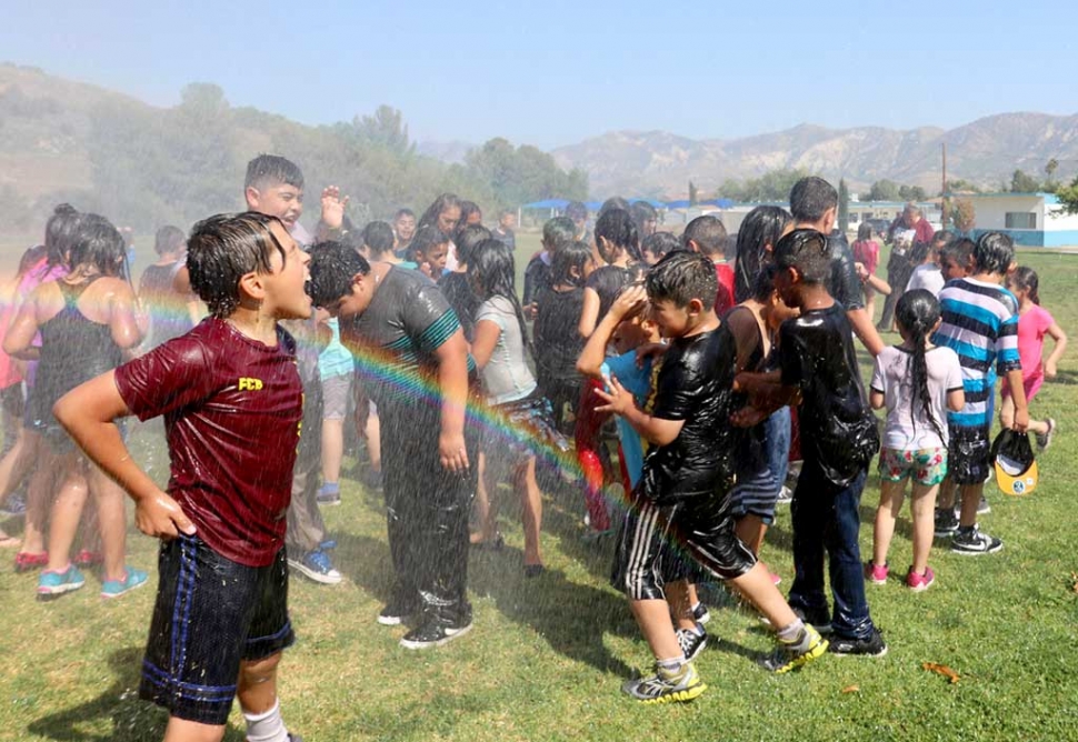 On Friday, June 2nd Fillmore Fire Crews hosted their Annual Wet Down with the kids at San Cayetano Elementary School. With perfect weather the kids were able to enjoy playing in the cool water from Fillmore Fire Stations Unit 91. Photos Courtesy Sebastian Ramirez.