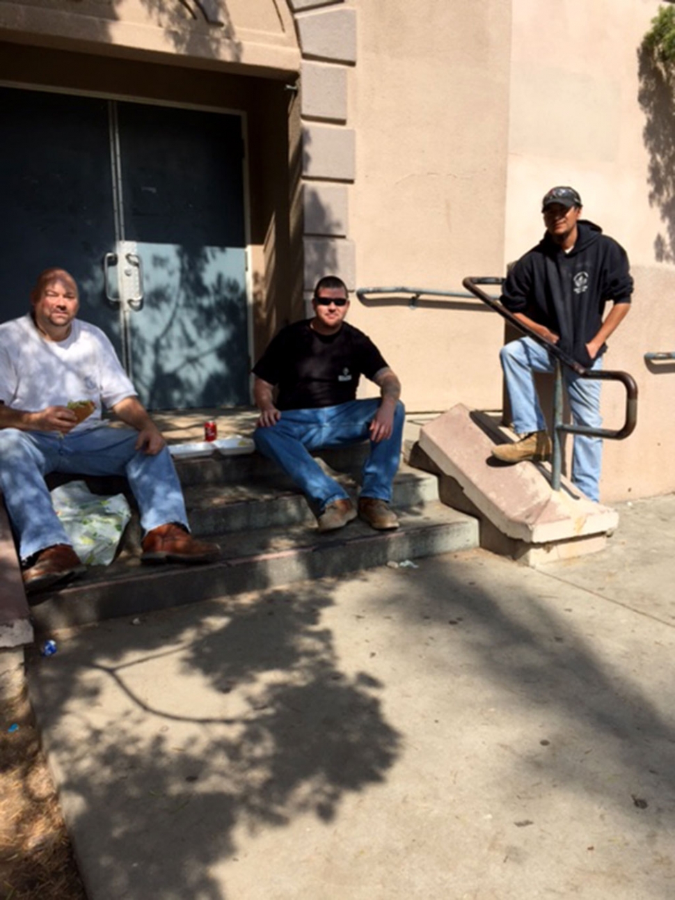 Jeff Bode, Chris Houston and Rene Guzman taking a lunch break. They are donating their time to help with the new Teen Study Center.