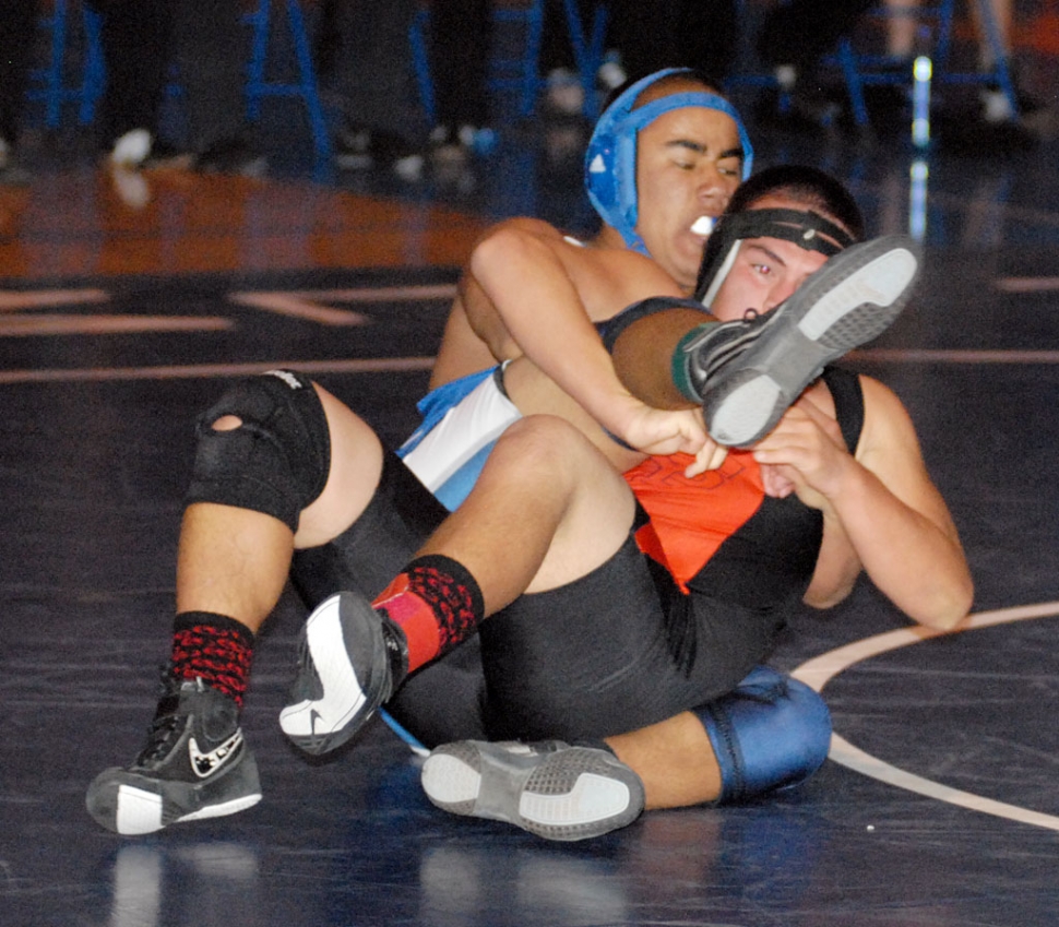 Marco Vega gets his opponent all twisted during the match.