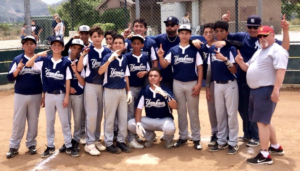 This past Saturday, May 18th the Junior Division Fillmore Yankees Baseball team defeated the Santa Paula Junior Diamondbacks 3 -2 to claim the District 63 South Playoffs Championship title. The Fillmore Yankees completed their season as first place in standings with 12 wins, 4 losses, and 2 ties out of 11 teams in the South-Junior Division.  Thanks to everyone who came out to support these teams and coaches.  Next up for the Yankees is District 63 North vs. South Championship Saturday June 1st (time and location TBA).  Come out and show your support! (l-r) Jacob Navarro, Isaac Garibay, Nate Torres, Nathan Delgadillo, Andrew Portugal, Isaia Gutierrez, Jacob Muñoz, Dorian Foster, Oscar Navarro, David Jimenez, Anthony Chessani, Ivan Becerra, David Montes, Coaches: Sergio Becerra and Gene Evans, Manager: Alex Portugal.