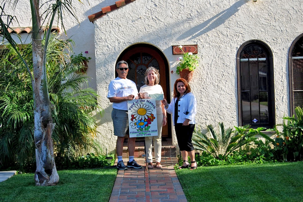 Theresa Robledo presents Fillmore Vision 2020 Civic Pride’s Yard of the Month for May to Edward and Margaret Rodriguez! Congratulations!  The yard is located at 532 Kensington Way, you will find beautiful tropical palm trees, pigmies, cal lilies, and luscious green lawn.  Edward and Margaret moved to Fillmore 3 years ago into their beautiful Spanish style home!  Edward is the primary care taker of the yard and enjoys maintaining it!  A Big Thank you to Otto & Sons Nursery for providing a gift certificate to the winners, where they will find more of their gardening and plant needs! 