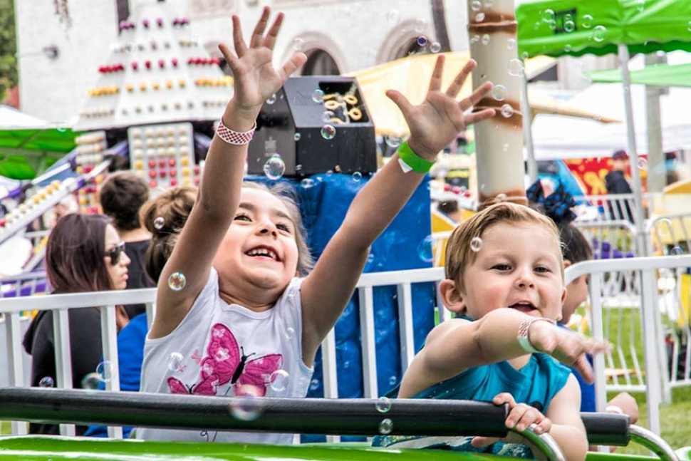 MAY – Kid’s enjoying one of the ride at this past years Annual May Festival, which also had games, food, music and much more for all families to enjoy. Photo By Bob Crum.
